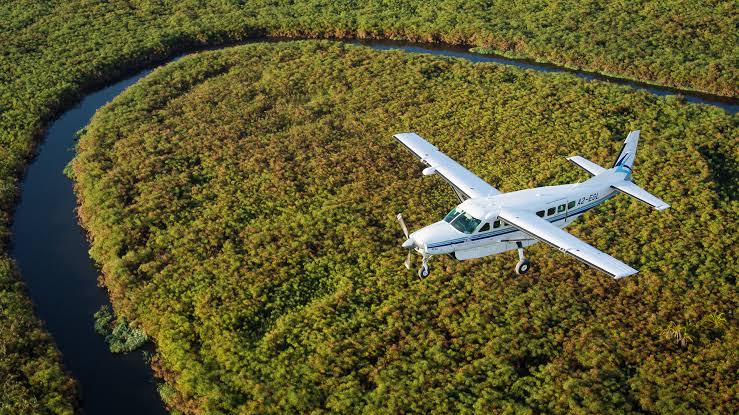Scheduled flight over Kenya's Central Highlands en route to Lewa