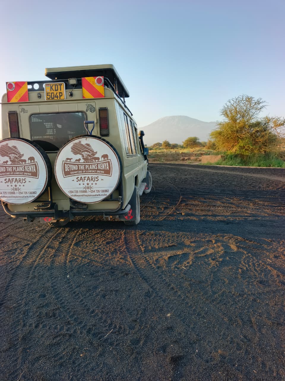 Beyond The Plains Kenya Safaris vehicle at sunset in Amboseli with Mount Kilimanjaro backdrop