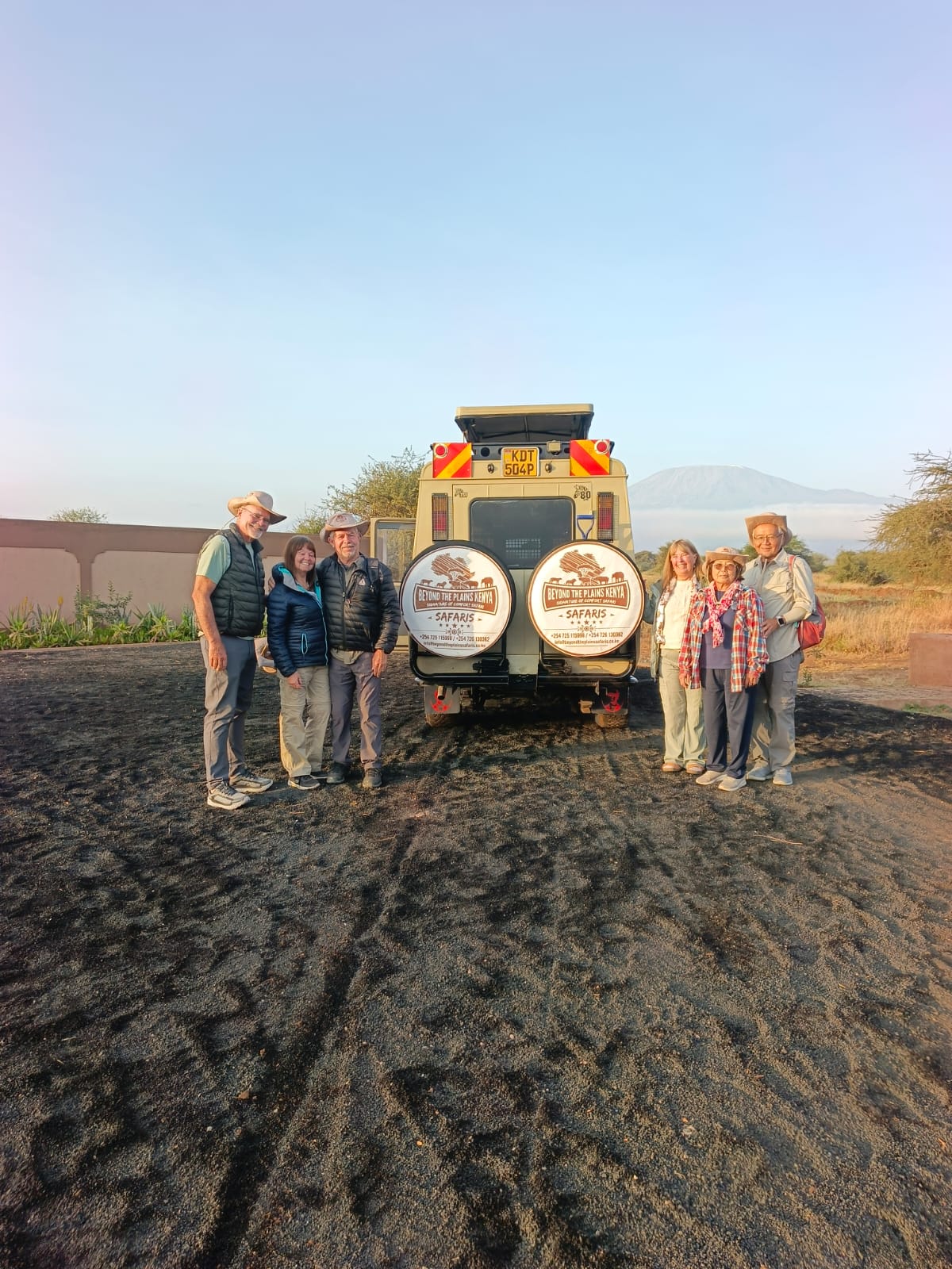 Beyond The Plains Safaris guests at Amboseli National Park with Mount Kilimanjaro backdrop Kenya safari holiday