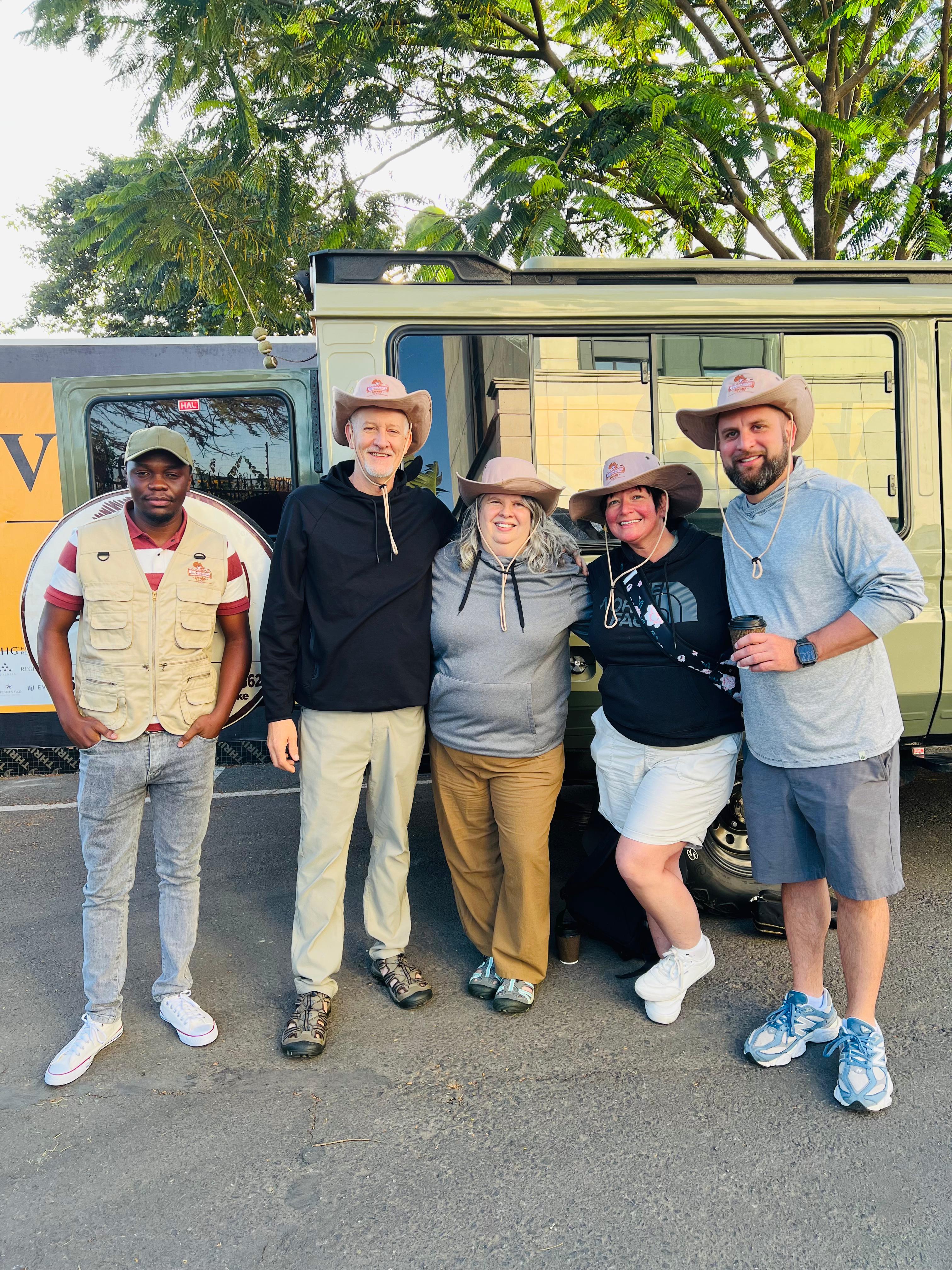 Beyond the Plains Safaris guide and clients ready for a Kenya wildlife safari departure in a 4x4 Land Cruiser