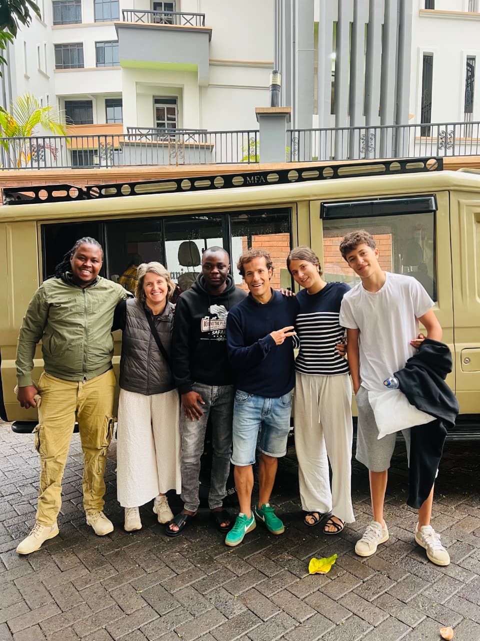 A Beyond the Plains Safaris guide welcomes a family of US travelers ahead of their luxury Tanzania safari