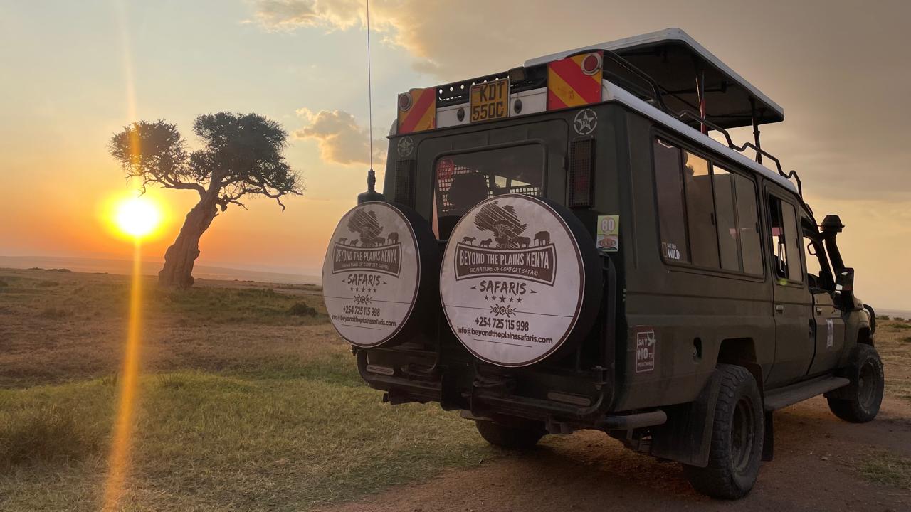 Beyond the Plains Safaris 4x4 Land Cruiser at sunset in the Maasai Mara