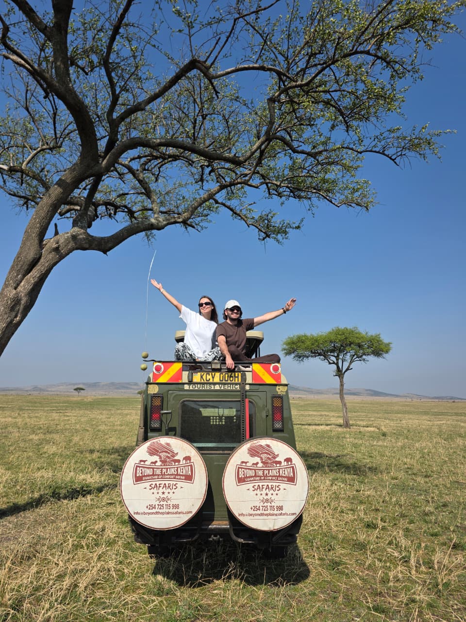 Safari guests enjoying an uncrowded game drive in the Maasai Mara