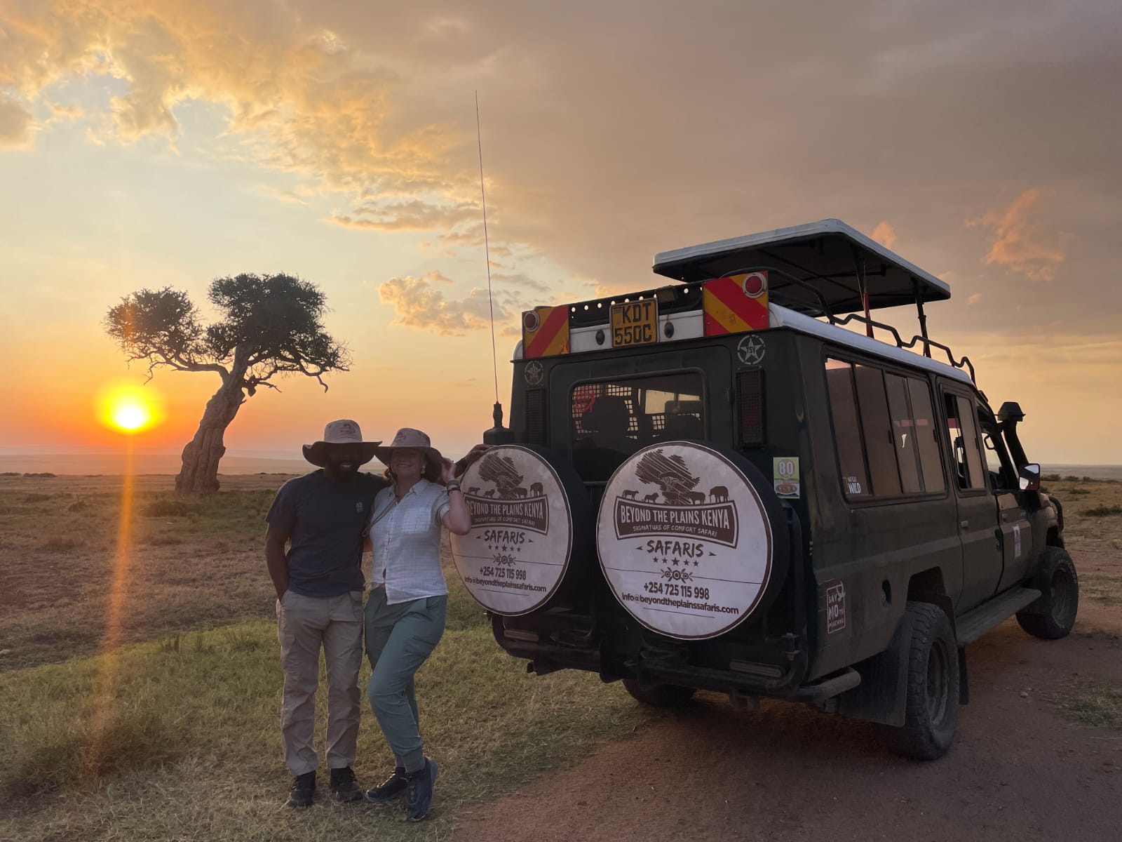 Beyond the Plains Safaris guide and guest at sunset in the Maasai Mara